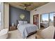 Bedroom with a modern aesthetic and a stunning city view from the expansive windows at 400 W Peachtree Nw St # 3711, Atlanta, GA 30308