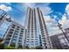 Stunning exterior view of modern high rise building with reflective glass and balconies at 400 W Peachtree Nw St # 3711, Atlanta, GA 30308