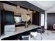 Modern kitchen bar with pendant lighting and cowhide bar stools offers unique design at 400 W Peachtree Nw St # 3711, Atlanta, GA 30308