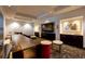 Modern theater room featuring lounge seating, recessed lighting, and a large flat screen television at 400 W Peachtree Nw St # 3711, Atlanta, GA 30308