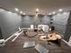 This basement is under construction, with new flooring, a modern wall design, and recessed lighting at 199 Scenic View Ln, Stone Mountain, GA 30087