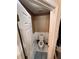 Powder room featuring a toilet, awaiting renovations to restore this room at 199 Scenic View Ln, Stone Mountain, GA 30087