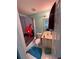 Bright bathroom with Spider-Personal shower curtain, vanity, toilet, and blue walls at 199 Scenic View Ln, Stone Mountain, GA 30087