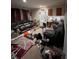 This living room is in disarray with furniture, a drill, and other items strewn about at 199 Scenic View Ln, Stone Mountain, GA 30087