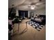 Spacious main bedroom with a ceiling fan, desk, and king-size bed at 199 Scenic View Ln, Stone Mountain, GA 30087