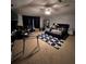 Spacious main bedroom with a ceiling fan, blue rug, and ample natural light at 199 Scenic View Ln, Stone Mountain, GA 30087
