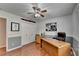 Home office or bedroom with hardwood floors, a ceiling fan, and a closet at 1990 Holly Cove Rd, Cumming, GA 30040