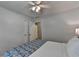 Bright bedroom featuring hardwood floors and a ceiling fan at 1990 Holly Cove Rd, Cumming, GA 30040