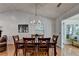 Bright dining room with a vaulted ceiling, hardwood floors, and natural light at 1990 Holly Cove Rd, Cumming, GA 30040