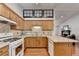 Updated kitchen with hardwood floors, countertops and breakfast bar at 1990 Holly Cove Rd, Cumming, GA 30040