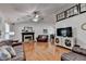 Spacious living room with vaulted ceilings, fireplace, and hardwood floors at 1990 Holly Cove Rd, Cumming, GA 30040