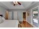 Spacious main bedroom featuring hardwood floors and easy access to main bath at 1990 Holly Cove Rd, Cumming, GA 30040