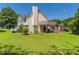 Exterior view showing the large backyard, deck, and patio at 2325 Sailor Ln, Suwanee, GA 30024