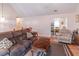 Cozy living room with wood floors at 2325 Sailor Ln, Suwanee, GA 30024