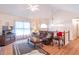 Upstairs living room features wood floors and vaulted ceiling at 2325 Sailor Ln, Suwanee, GA 30024