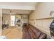 Cozy finished basement with a built-in bookcase, large leather sofa, and natural light from the lower windows at 7490 Hunters Ridge Dr, Douglasville, GA 30134