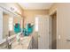 Bathroom showcasing a marble countertop vanity and neutral wall color at 7490 Hunters Ridge Dr, Douglasville, GA 30134