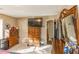 Bedroom with wooden furniture, including dressers, providing plenty of space and storage at 7490 Hunters Ridge Dr, Douglasville, GA 30134