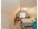 Spacious bedroom with neutral paint, carpeted floor, and a window for natural light at 7490 Hunters Ridge Dr, Douglasville, GA 30134