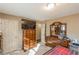 Spacious bedroom with wooden furniture and a large window, creating a comfortable and inviting atmosphere at 7490 Hunters Ridge Dr, Douglasville, GA 30134