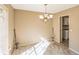 Charming dining room featuring a vintage chandelier and neutral color palette, perfect for cozy gatherings at 7490 Hunters Ridge Dr, Douglasville, GA 30134