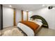Cozy bedroom featuring a unique headboard, soft rug, and natural wood accents at 170 Boulevard Se # 221E, Atlanta, GA 30312