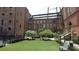 Beautiful courtyard featuring artificial turf with benches and lounge chairs at 170 Boulevard Se # 221E, Atlanta, GA 30312