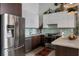 Bright kitchen with stainless steel appliances, light backsplash, and modern cabinetry at 170 Boulevard Se # 221E, Atlanta, GA 30312
