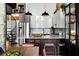 Modern kitchen featuring stainless steel appliances, sleek cabinets, and a spiral staircase at 170 Boulevard Se # 221E, Atlanta, GA 30312