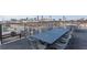 Spacious rooftop patio with skyline views offers ample seating for outdoor gatherings at 170 Boulevard Se # 221E, Atlanta, GA 30312
