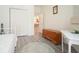 This bedroom has hardwood floors, a closet and a rustic brown chest at 2521 Eden Ridge Ln # 7, Acworth, GA 30101