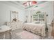 Spacious bedroom with natural light, hardwood floors, and large closet at 2521 Eden Ridge Ln # 7, Acworth, GA 30101