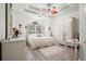 Bright bedroom with tray ceilings, neutral walls, hardwood floors, and an area rug at 2521 Eden Ridge Ln # 7, Acworth, GA 30101