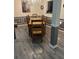 Dining room with a wooden table set with hardwood floors and gray-painted wainscoting at 2521 Eden Ridge Ln # 7, Acworth, GA 30101