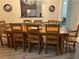 Dining room with large wooden table and gray-painted wainscoting detail at 2521 Eden Ridge Ln # 7, Acworth, GA 30101