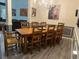 Dining area with a large table, hardwood floors, and gray wainscoting at 2521 Eden Ridge Ln # 7, Acworth, GA 30101