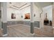 Elegant dining room with modern flooring, decorative columns, and an eye-catching chandelier at 2521 Eden Ridge Ln # 7, Acworth, GA 30101