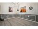 Elegant dining room with hardwood floors, chandelier, and stylish gray wainscoting at 2521 Eden Ridge Ln # 7, Acworth, GA 30101