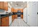 Updated kitchen with stainless steel appliances, granite counters, and white cabinets at 2521 Eden Ridge Ln # 7, Acworth, GA 30101