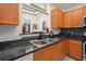 Stylish kitchen with granite countertops, stainless appliances, and wood look floors at 2521 Eden Ridge Ln # 7, Acworth, GA 30101