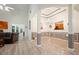 Elegant living space with open floor plan, chandelier, and a glimpse into the modern kitchen at 2521 Eden Ridge Ln # 7, Acworth, GA 30101