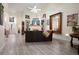 Spacious living room with fireplace, built-in bookshelves, high ceilings, and abundant natural light at 2521 Eden Ridge Ln # 7, Acworth, GA 30101