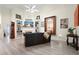 Bright living room featuring fireplace, built-in shelves, high ceilings, and large windows at 2521 Eden Ridge Ln # 7, Acworth, GA 30101