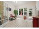 Bright sunroom with large windows, comfortable seating, and access to the outdoors at 2521 Eden Ridge Ln # 7, Acworth, GA 30101