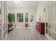 Bright sunroom with large windows, hardwood floors, and access to the backyard at 2521 Eden Ridge Ln # 7, Acworth, GA 30101