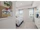 Bright bedroom with a bulletin board and ample natural light from large windows at 67 Wilder Ridge Way, Lawrenceville, GA 30044