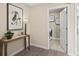 Welcoming entryway with stylish decor and access to a convenient laundry room at 67 Wilder Ridge Way, Lawrenceville, GA 30044
