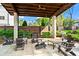 Outdoor covered grilling area with tables and chairs provides a welcoming community space at 12 Becker Nw Pl, Atlanta, GA 30307