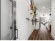 Contemporary hallway showcasing hardwood floors, sleek lighting, and bicycle rack at 12 Becker Nw Pl, Atlanta, GA 30307