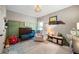 Charming bedroom with wood accent wall, playful decor, and patterned rug at 1270 Briarwood Ne Rd, Atlanta, GA 30319